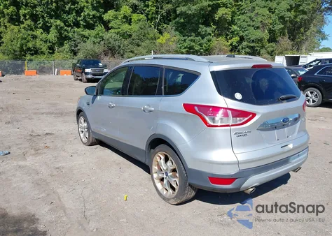 2015 Ford Escape Titanium z USA, uszkodzony, nr VIN 1FMCU9JX2FUA97233